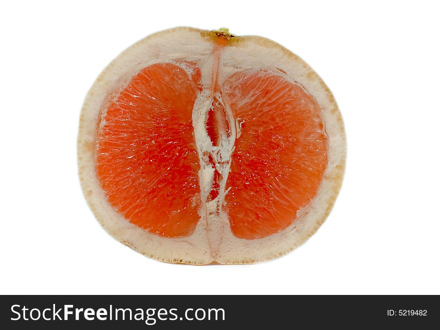 A half gapefruit, with a clear white background. A half gapefruit, with a clear white background.