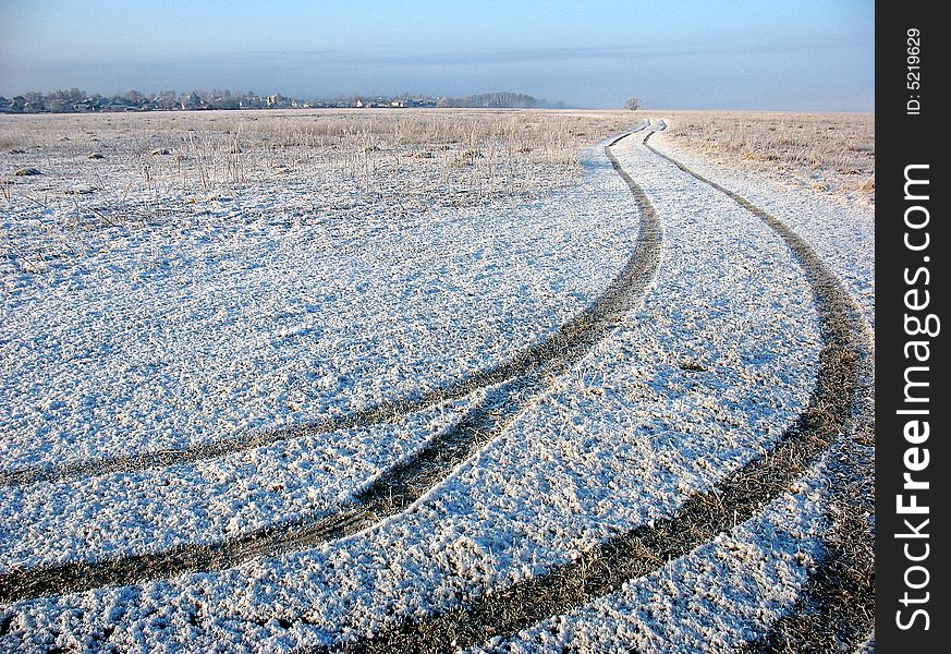 Machine trace on snow-clad field. Machine trace on snow-clad field
