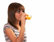 Girl Drinking Juice Royalty Free Stock Photos