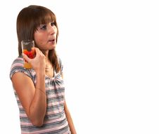 Girl Drinking Juice Royalty Free Stock Images