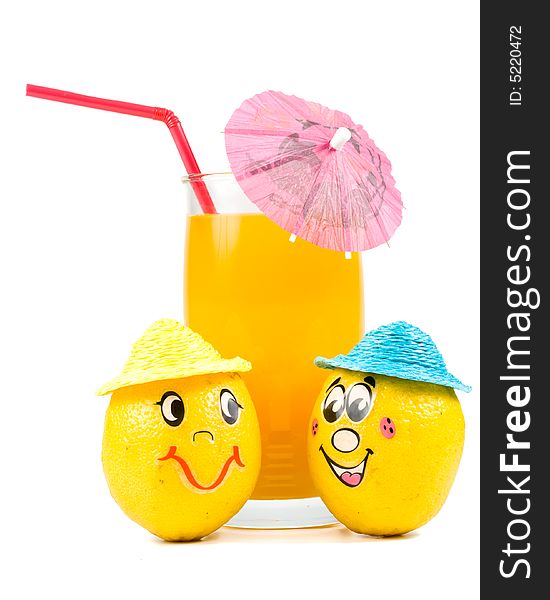 Cheerful little men from a fresh lemon and a juice glass isolated on a white background