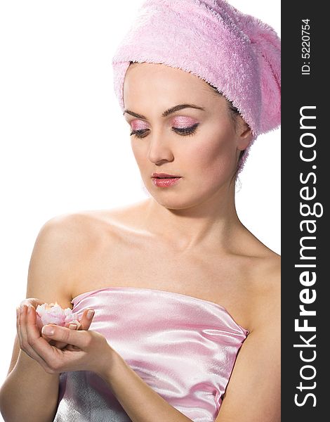 Beautiful woman wearing pink towel on her head