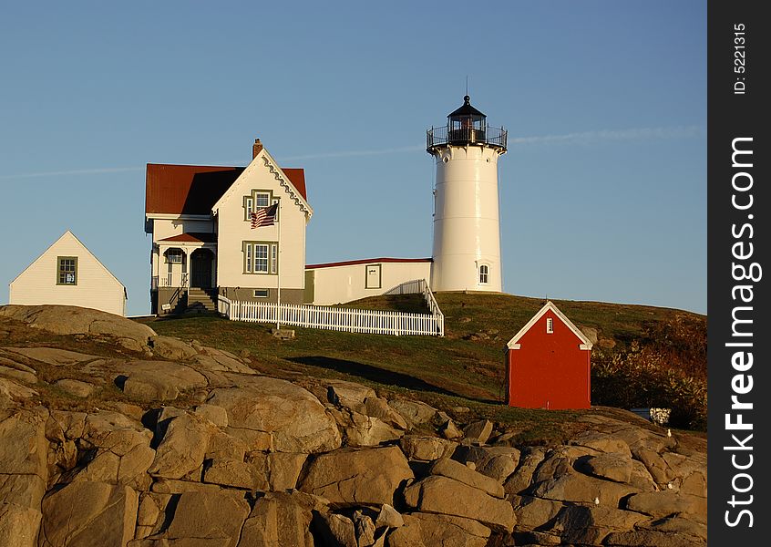 Picturesque lighthouse along the rocky coast of New England