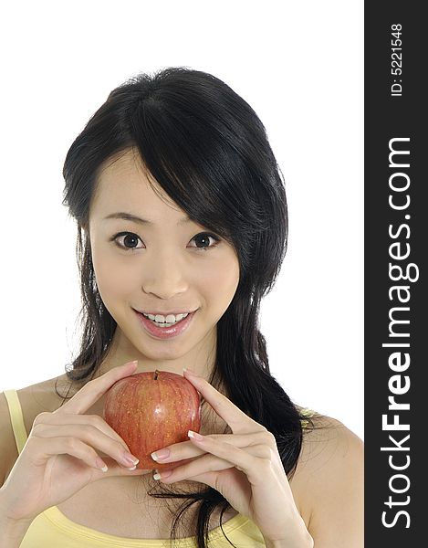 Pretty smiling woman with apple