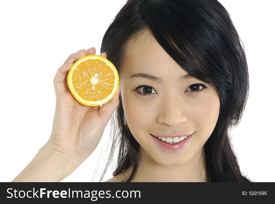 Pretty smiling woman with orange