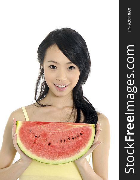 Pretty smiling woman with watermelon