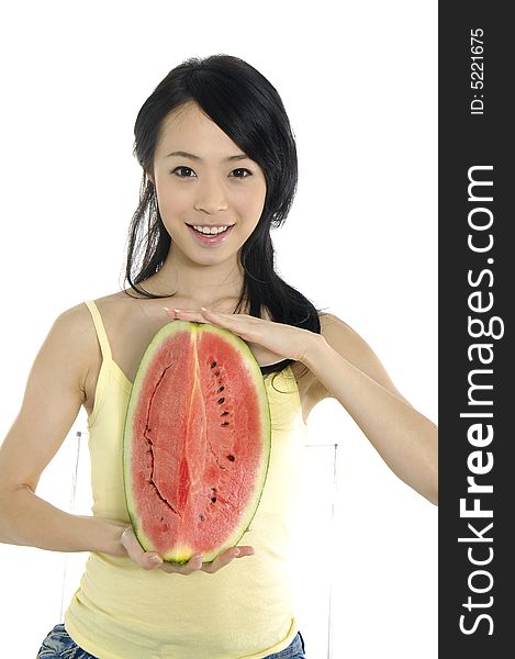 Pretty smiling woman with watermelon