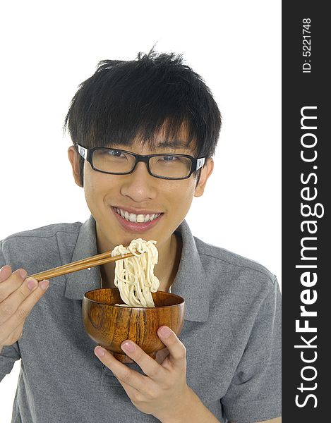 Young Asian boy eating food