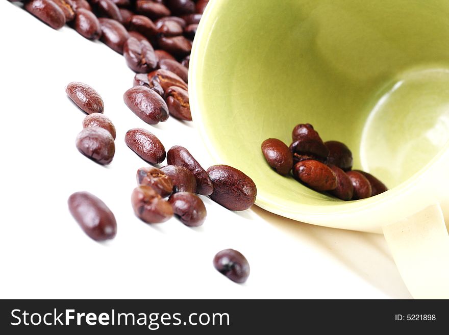 Beautiful photo of coffee beans and coffee mug