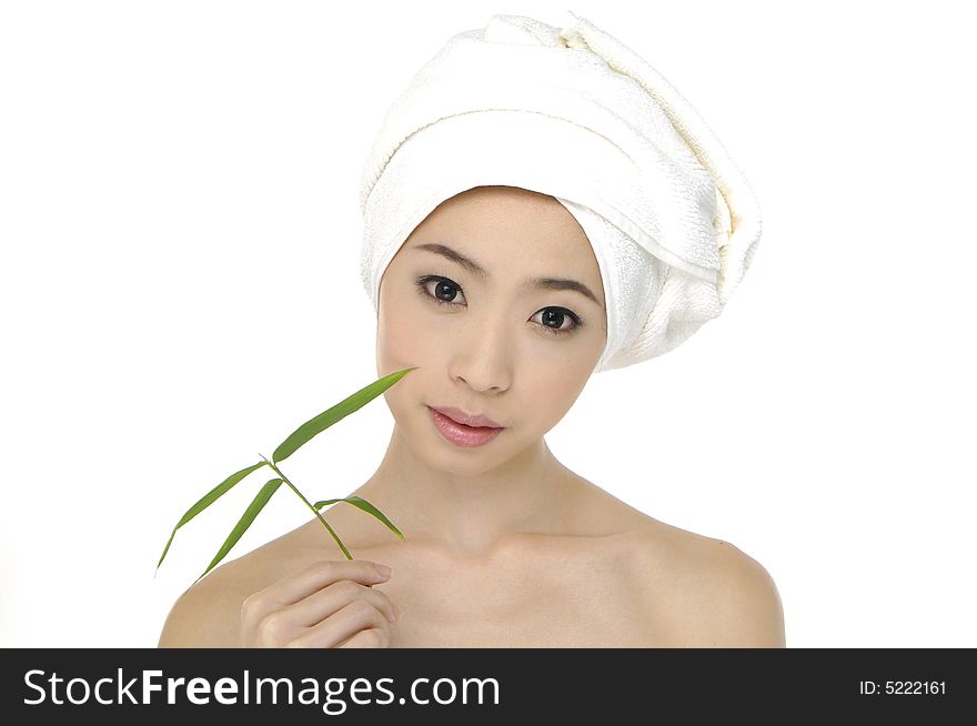 Portrait of Fresh and Beautiful woman wearing white towel on her head. Portrait of Fresh and Beautiful woman wearing white towel on her head