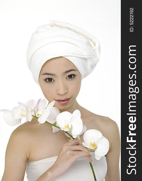 Portrait of Fresh and Beautiful woman wearing white towel on her head