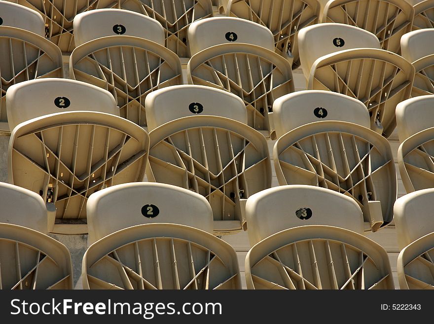 numbered folding chair at a stadium. numbered folding chair at a stadium