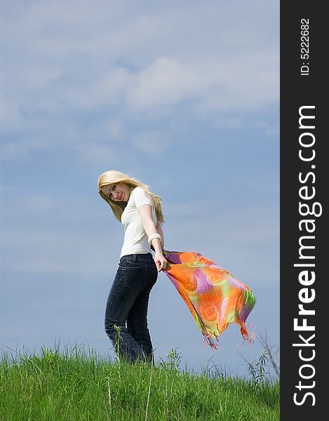 Girl with  scarf stand on a wind. Girl with  scarf stand on a wind