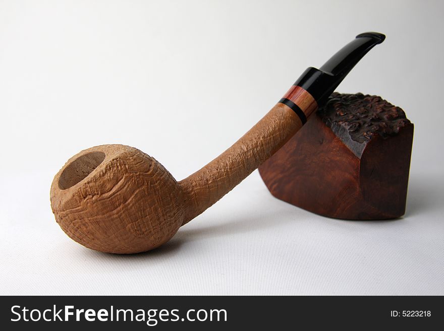 An tobacco pipe on white background.