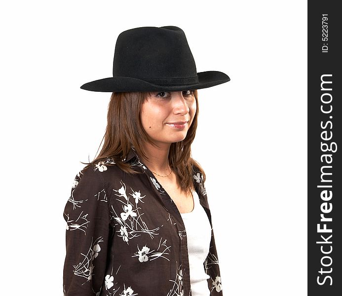 The girl in a brown jacket and a cowboy's hat. The girl in a brown jacket and a cowboy's hat