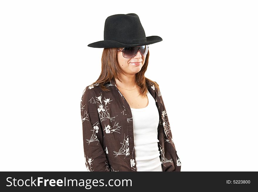 The girl in a brown jacket and a cowboy's hat. The girl in a brown jacket and a cowboy's hat