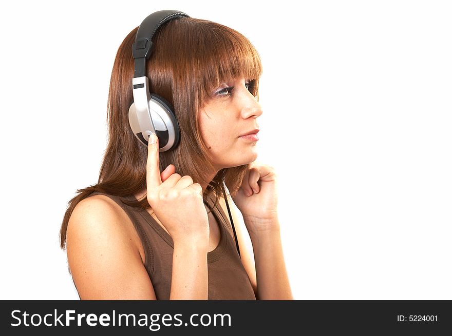 The girl in brown with headphones on a white background