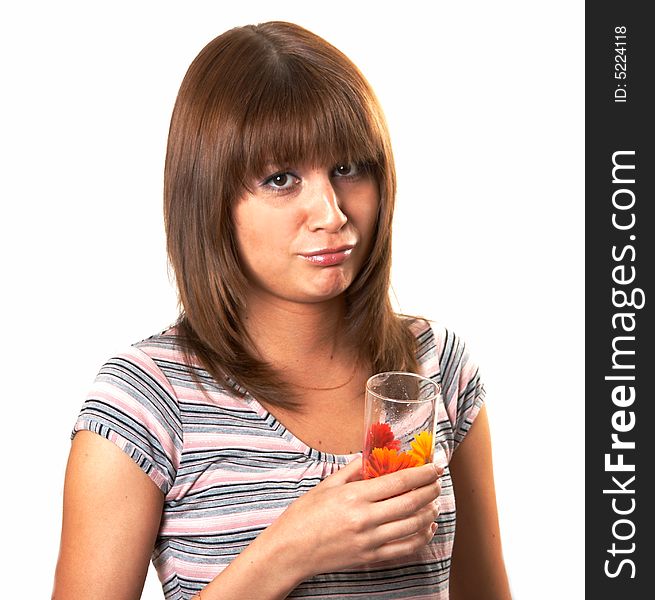 The girl drinking juice on a white background