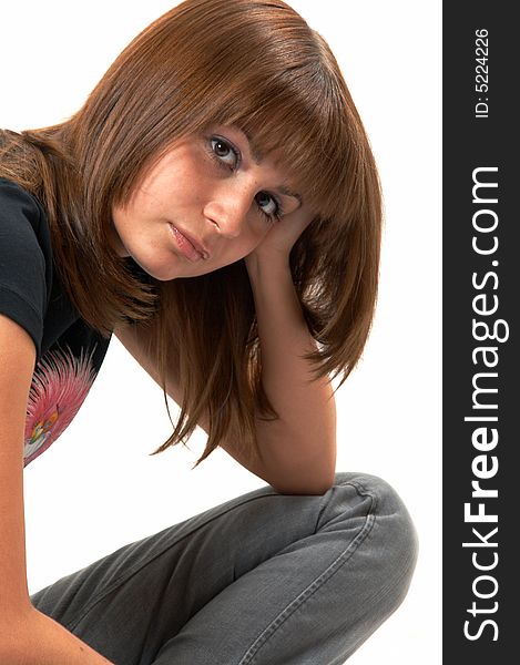 Girl In A Black Vest Sits On A Floor