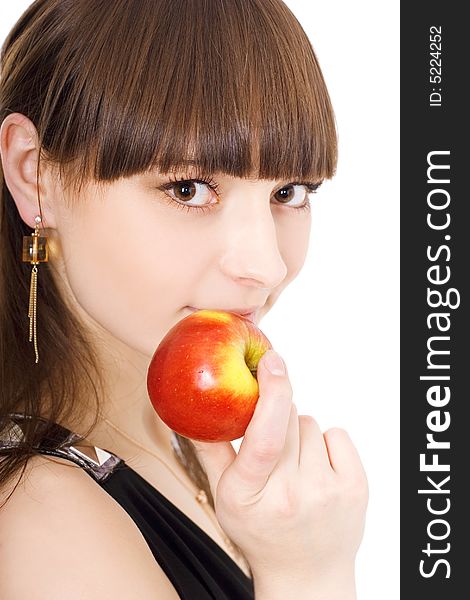 Portrait of cute brunette with an apple on white background. Portrait of cute brunette with an apple on white background