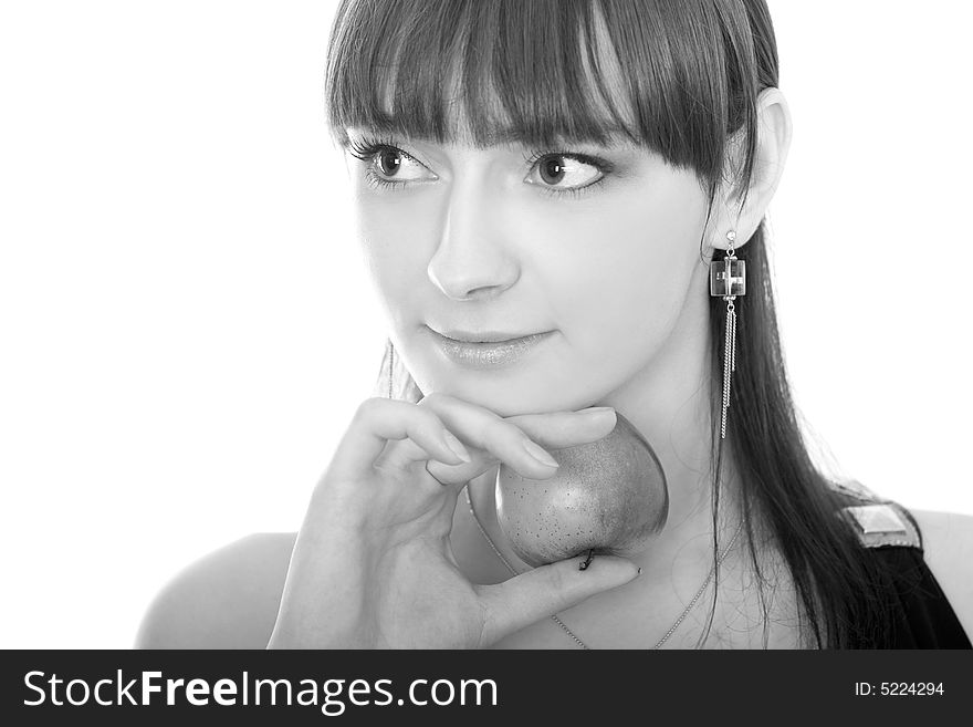 Portrait of cute brunette with an apple on white background in monochrome. Portrait of cute brunette with an apple on white background in monochrome