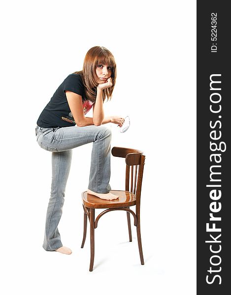 The girl with a chair on a white background