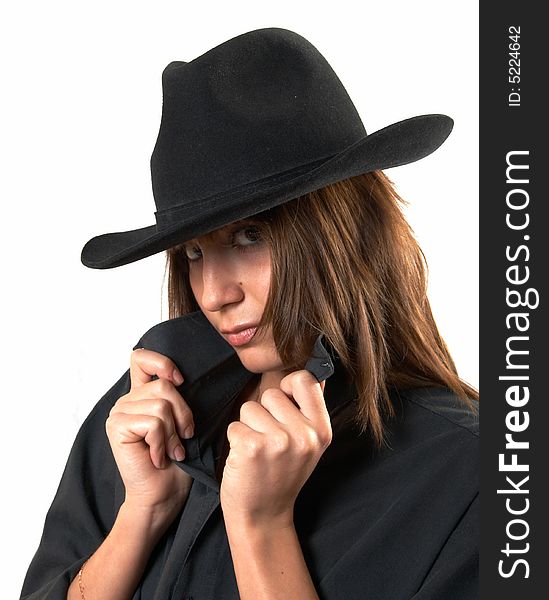 Girl in a black shirt and a cowboy s hat