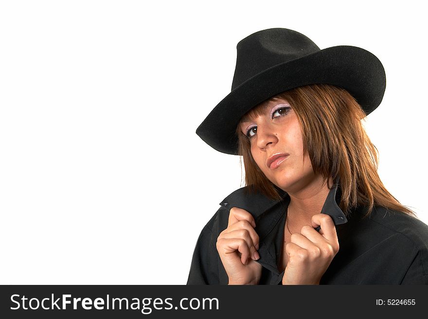 The girl in a black shirt and a cowboy's hat