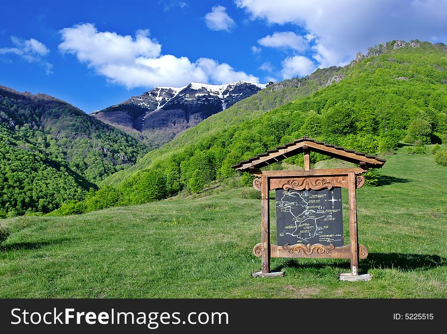 Sign with map of ecotrail and High Mountain