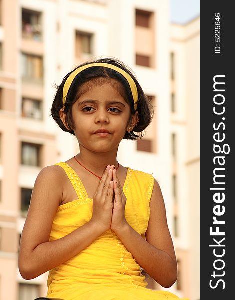 A beautiful Indian girl doing her prayers. A beautiful Indian girl doing her prayers.