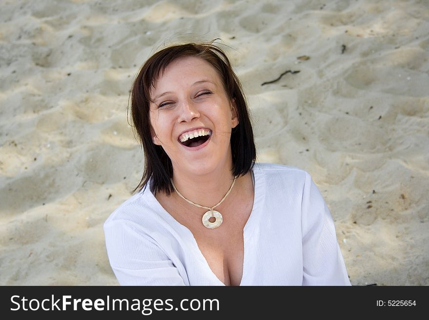 Girl sitting on the beach. Girl sitting on the beach