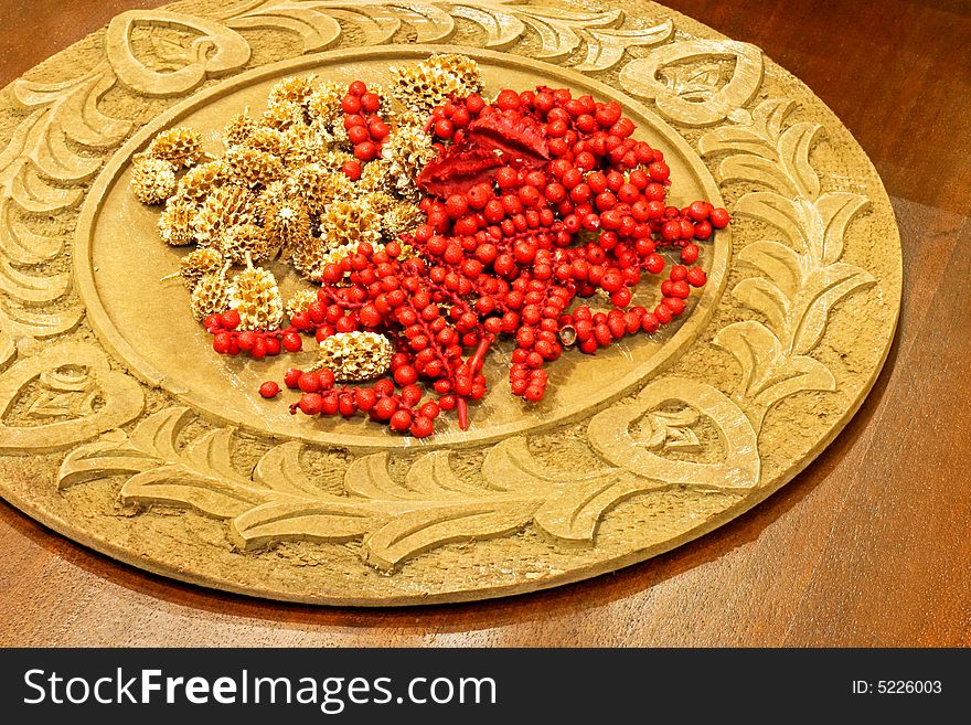 Berry and seeds decoration on the plate. Berry and seeds decoration on the plate