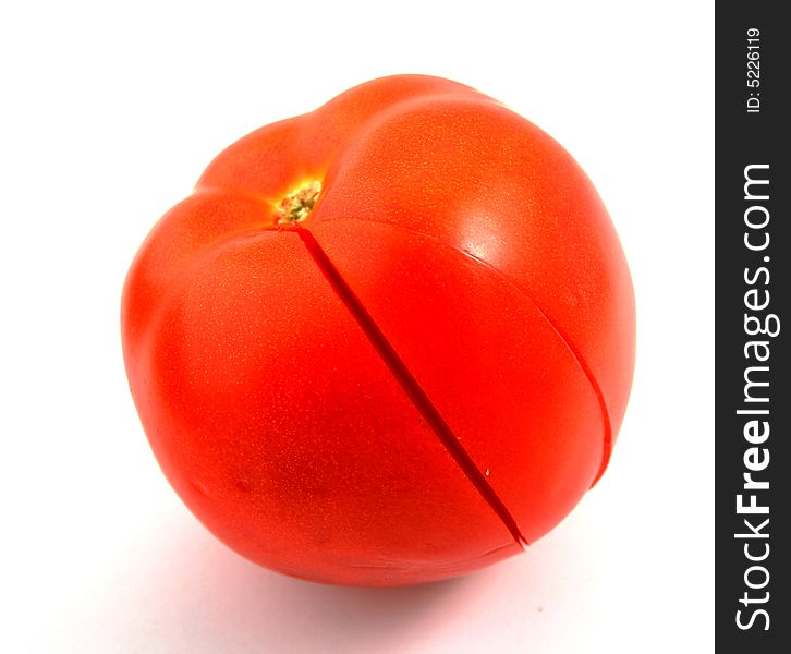 Fresh tomato over white. Isolated
