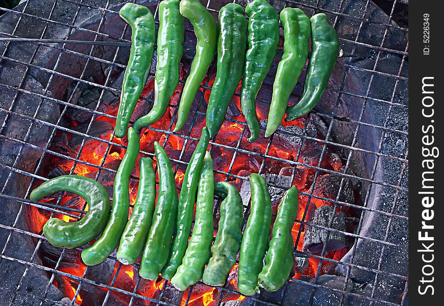 Grill green chilly for spicy herb