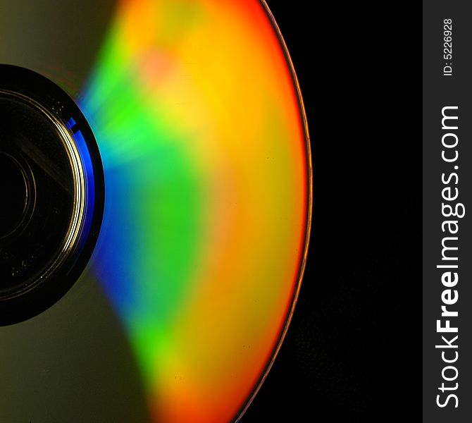 Abstract view of CD covered show light refractions. Abstract view of CD covered show light refractions