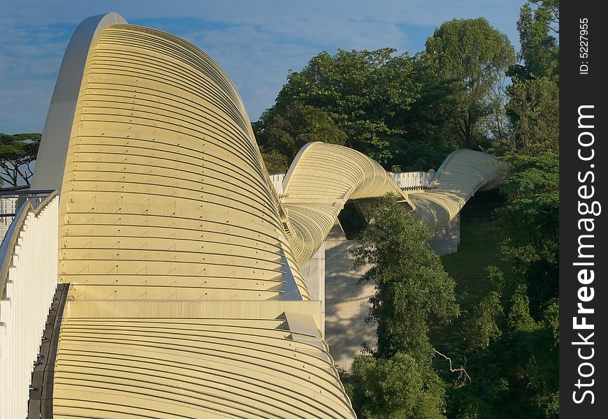 Bridge over a high valley with a sinuous curve design at dawn. Bridge over a high valley with a sinuous curve design at dawn