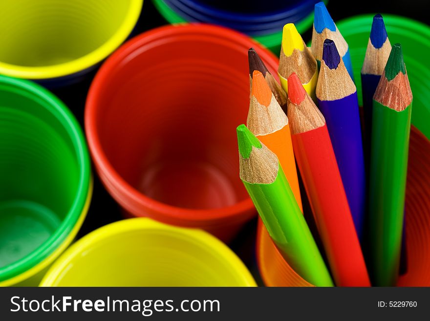 Colour pencils with colour plastic cups