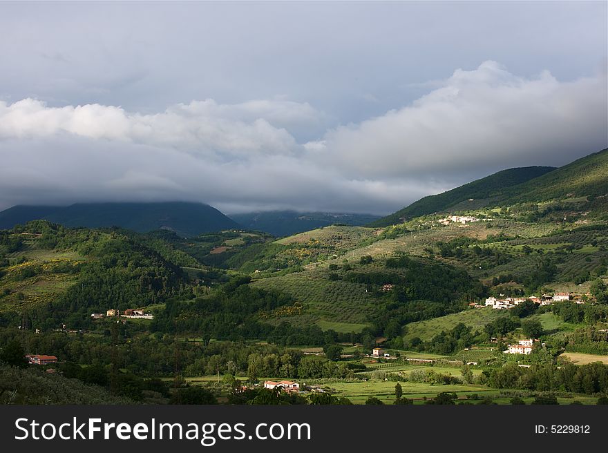 Umbria mountains with clouds near Foligno. Umbria mountains with clouds near Foligno
