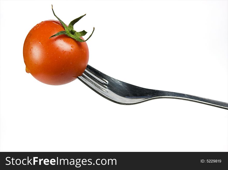 Fork with Fresh Red Tomato. Fork with Fresh Red Tomato
