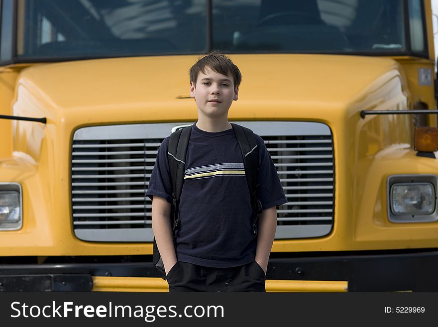 Student near the school bus