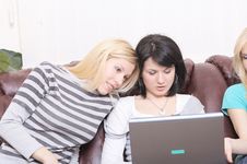 Girlfriends Surfing On The Internet And Having Fun Stock Photo