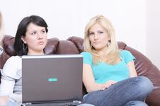 Girlfriends Surfing On The Internet And Having Fun Stock Photography