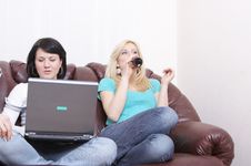 Girlfriends Surfing On The Internet And Having Fun Royalty Free Stock Image
