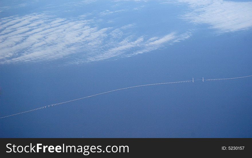 The bridge spanning the sea of gulf of Hangzhou is the longest bridge building in the world at present, total length is 36 kilometers. This photo is shot while going by air. The bridge spanning the sea of gulf of Hangzhou is the longest bridge building in the world at present, total length is 36 kilometers. This photo is shot while going by air.