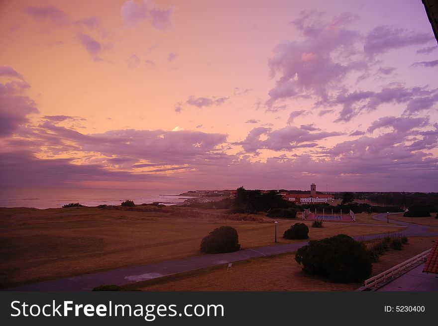 This is a photo of the Orange Sky over ocean in Argentina