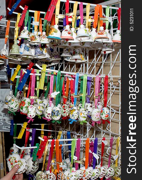 Traditional souvenirs of hungary- porcelain bells, egg, hearts. Traditional souvenirs of hungary- porcelain bells, egg, hearts