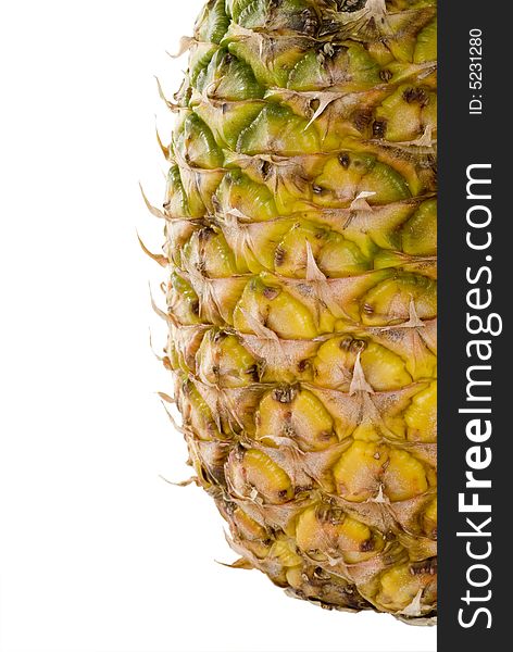 A whole pineapple isolated on a white background.