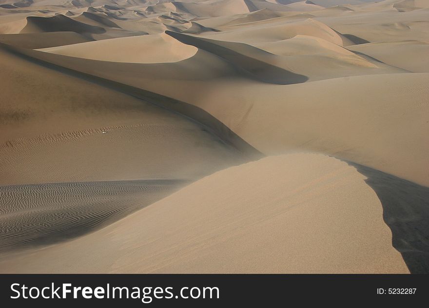 Shot of natural pattern in sand dunes. Huachina. Peru. Shot of natural pattern in sand dunes. Huachina. Peru