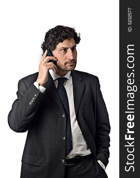 Businessman talking on the mobile phone, white background. Businessman talking on the mobile phone, white background