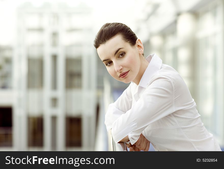 Portrait of young woman in white shirt. Portrait of young woman in white shirt